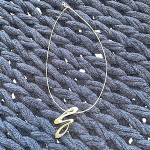 Breuning 17” necklace with a beautiful curve pendant, step up any t shirt!